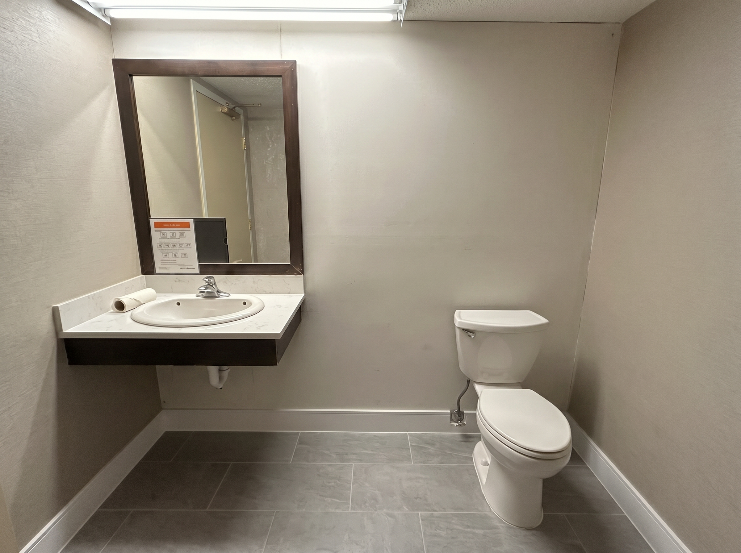 Before, /__l5e/assets-v1/3ea28112-465e-4a8f-bada-6cc26e4d6e8f/bathroom-commercial-calgary-before.jpg
